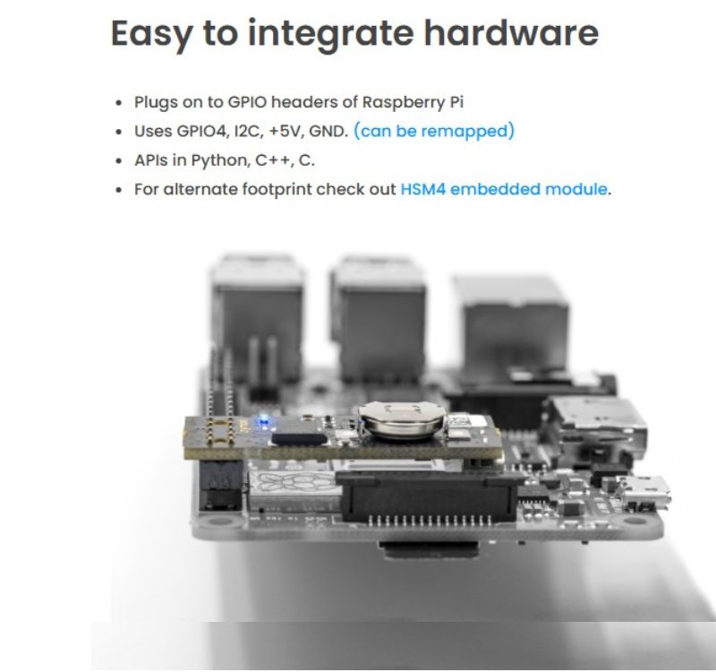 Zymkey4 hardware security module attached to Raspberry Pi's GPIO pins with labeled security features that protect against physical tampering and unauthorized access.